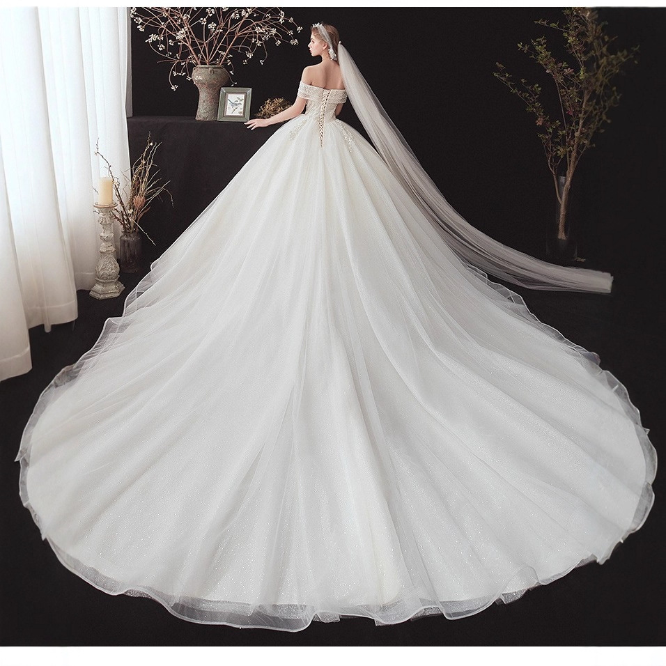 Vestido de novia con hombros descubiertos, nuevo estilo 2026, elegante y adelgazante, estilo francés de hadas con cola de cielo estrellado y dobladillo grande. image 4