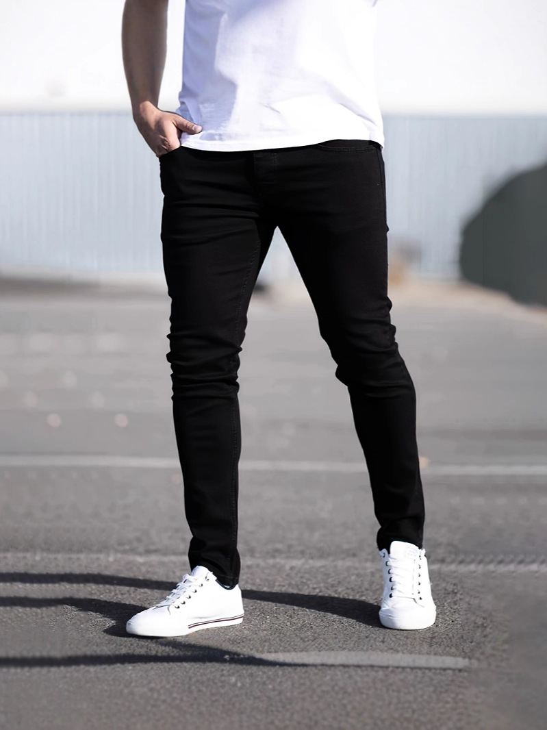 Europa y América Amazon estación independiente de moda de color sólido jeans elásticos de hombre pie pequeño de cintura media jeans de hombre