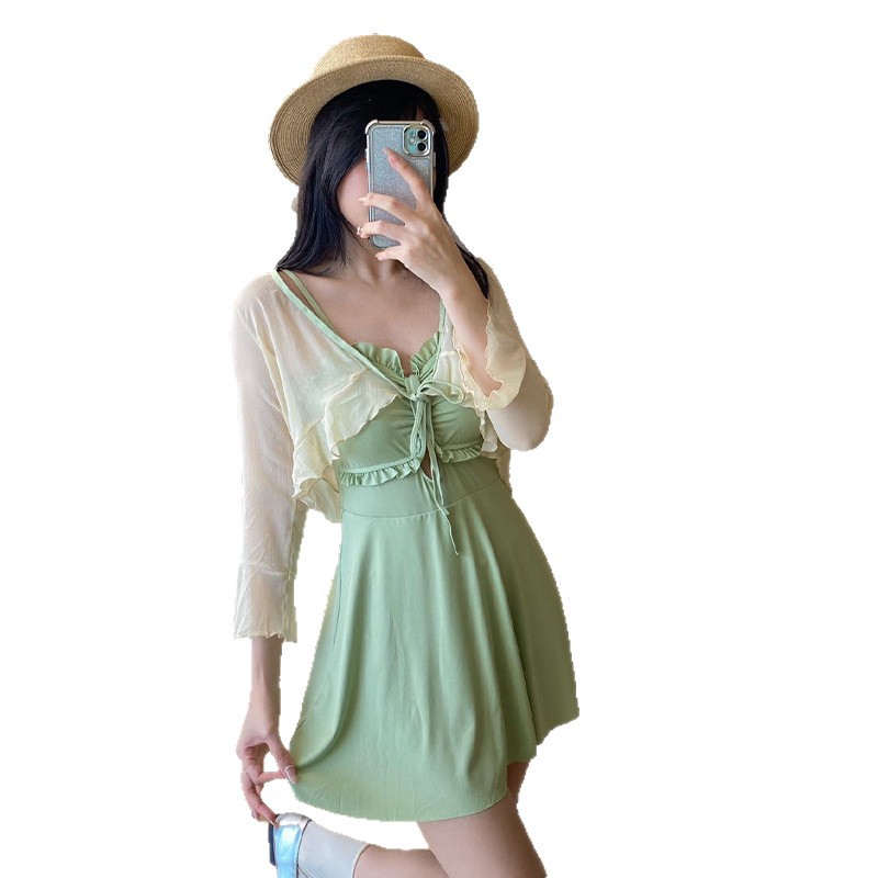 2025 nuevo traje de baño para mujer, una pieza, falda delgada y conservadora, sentido de alta gama, traje de baño de vacaciones de aguas termales junto al mar, mujer al por mayor