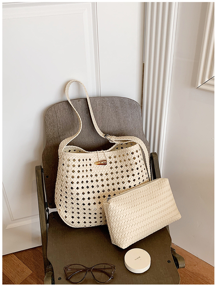 Bolsa de tejido hueco de gran capacidad para mujeres 2026 verano nuevo estilo coreano simple bolso de brazo de viaje bolsa de ocio