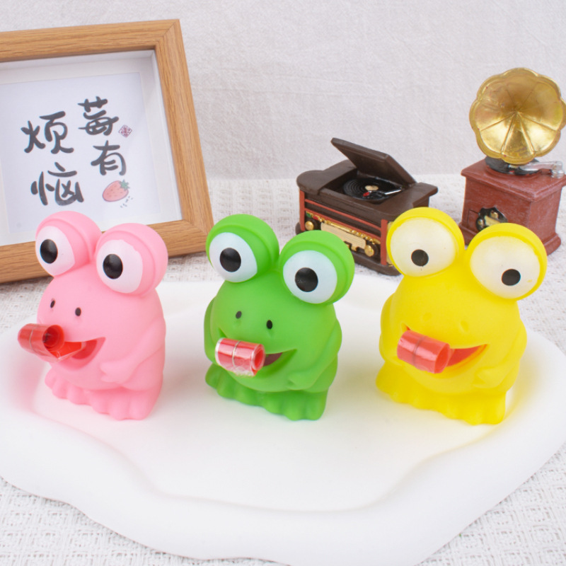 Creativa lengua de escupimiento rana dinosaurio BB silbato juguete sonido pellizco pellizco música descompresión pequeño dinosaurio ventilación muñeca estudiante primario