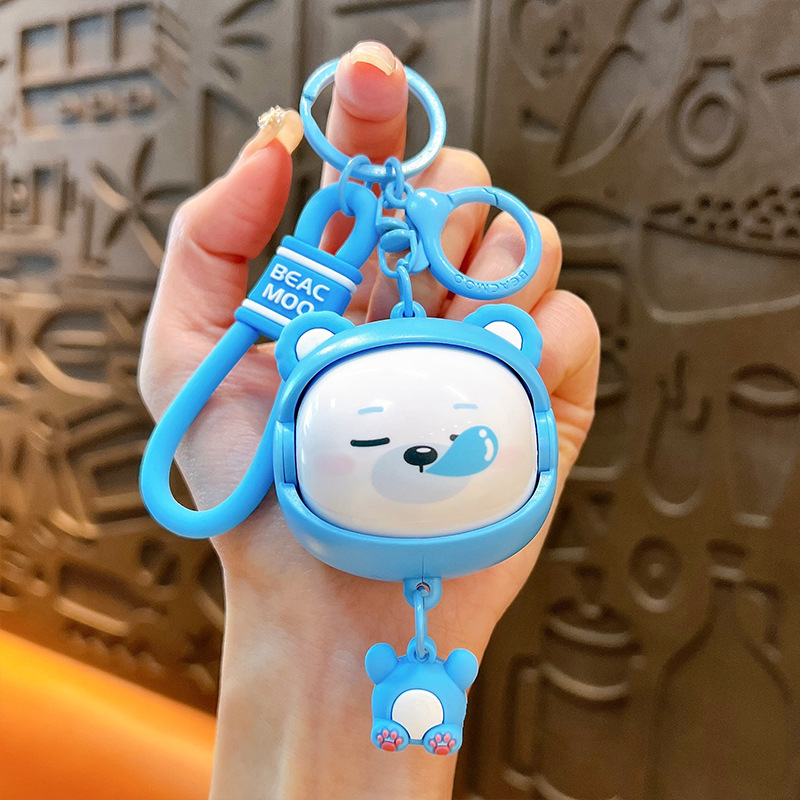 Llavero creativo de dibujos animados girando música lindo descompresión cambio de cara llavero de gato bolsos para hombres y mujeres pequeños regalos al por mayor