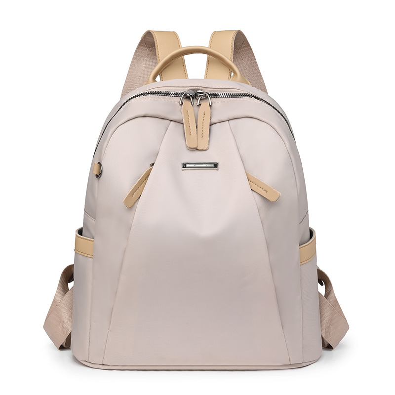 2024 verano nuevo estilo coreano damas mochila de nailon moda color contraste ligero mochila de viaje al aire libre al por mayor