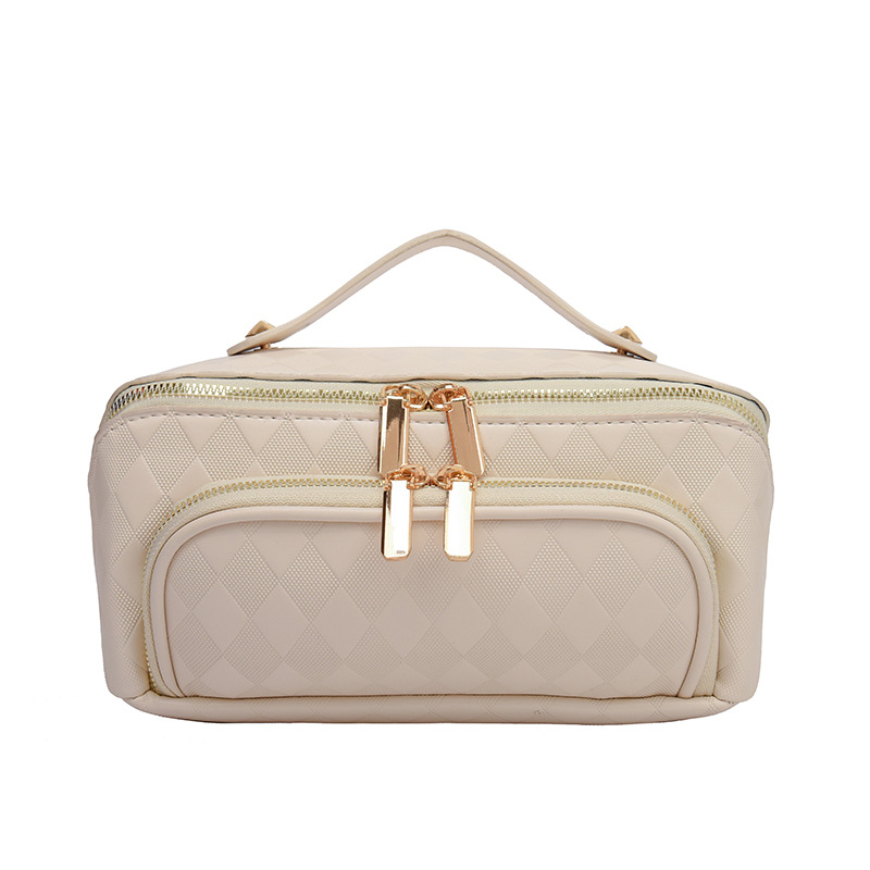 Nuevos bolsos de maquillaje transfronterizos pu-rango de nicho de moda de gran capacidad para mujeres bolsas de almacenamiento portátiles de viajes en línea bolsa de lavado roja