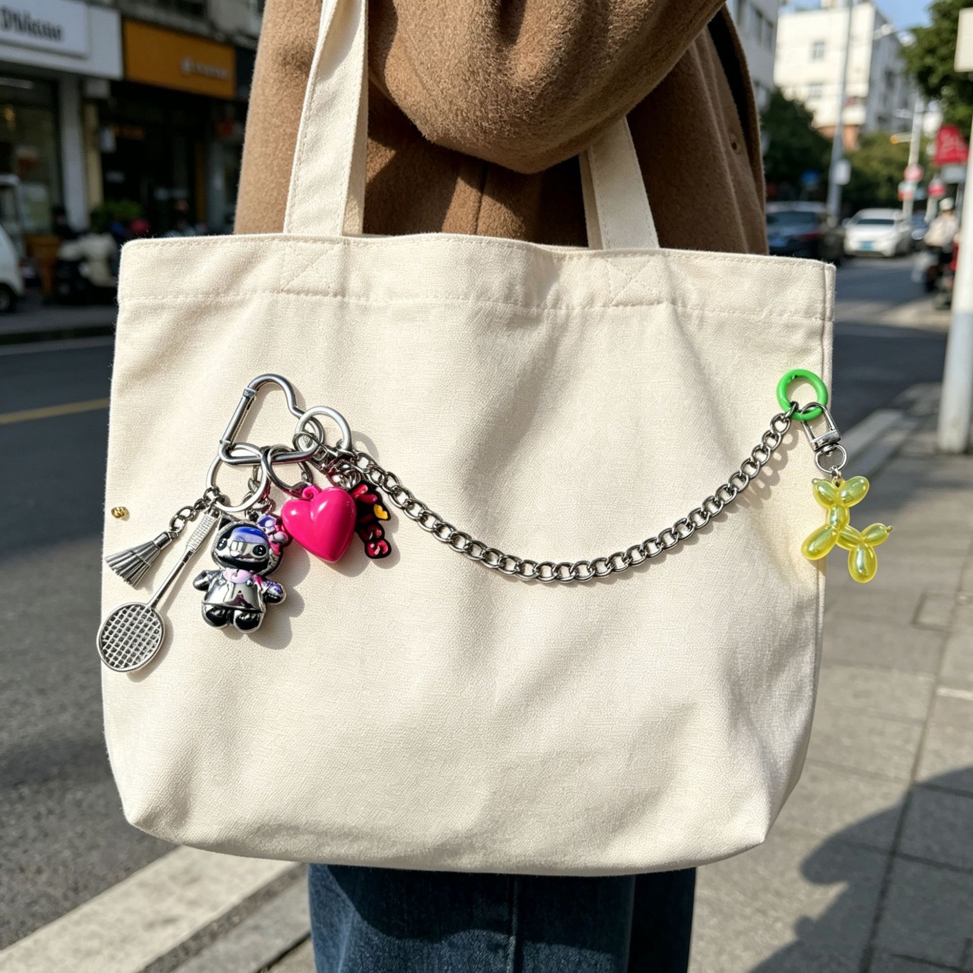 Caricatura encantadora Kitty gatos bolsos colgantes amor bádminton llaveros globos perros colgantes de doble hebilla