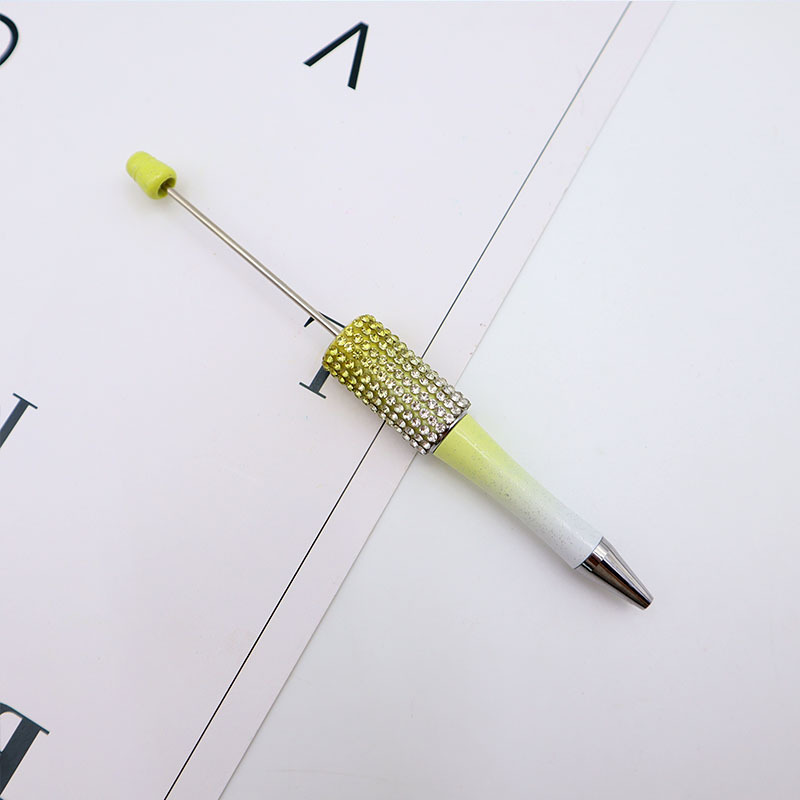 Bolígrafo giratorio de grano lindo de color degradado de tendencia de alto valor Bolígrafo de gomas galvanizado con cuentas de diamantes de bricolaje creativo