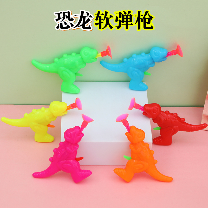 Catapulta mini ventosa de bala suave color pequeña pistola de dinosaurio niños al aire libre interacción entre padres e hijos actividades al aire libre juguetes baratos