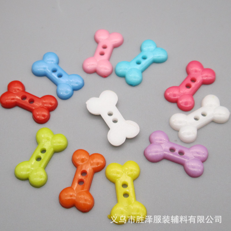 现货供应 儿童塑料狗骨头纽扣 DIY卡通纽扣 两眼骨头形状纽扣