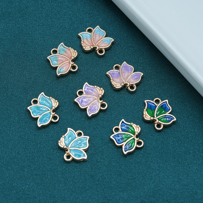 Alloy electrophoresis high color retention double-sided oil drop double hanging single small butterfly diy national style imitation point green bracelet earrings pendant Alloy electrophoresis high color retention double-sided oil drop double hanging single small butterfly diy national style imitation point green bracelet earrings pendant