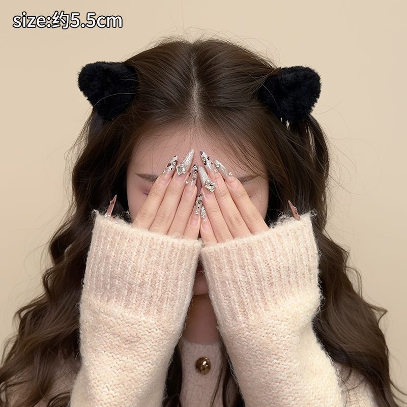 2#A pair of black plush triangles - about 5.5*4.5cm (with plush)