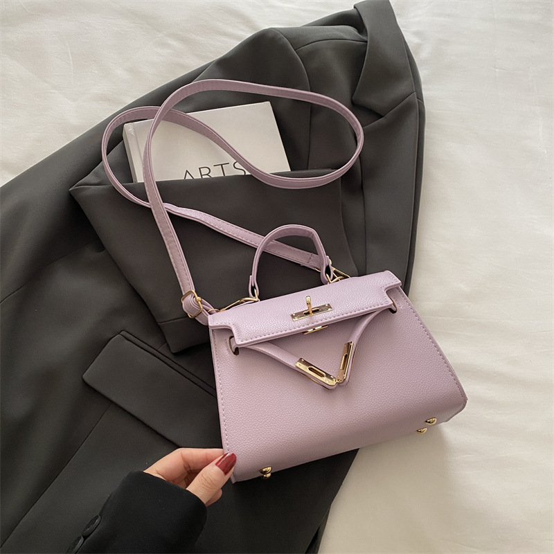 Nicho de alta sensación simple bolso de mano mujer 2024 nueva moda versátil bolso Kylie de moda bolso pequeño