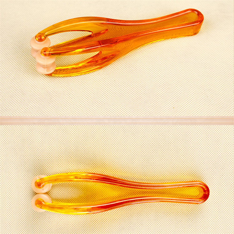 Spot al por mayor masajeador de dedos, rodillo de acupuntura para articulaciones, masaje de manos hermosas, clip de masaje de pulgar, regalo creativo