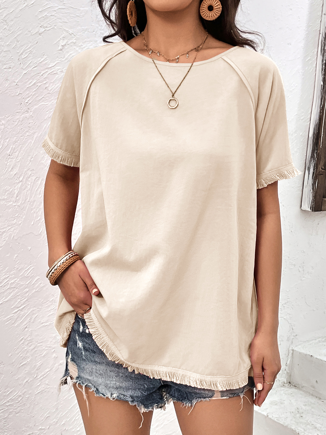 Top casual ampio con scollo tondo e frange da donna_voghion.com