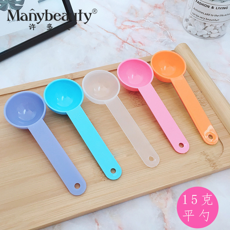 Factory wholesale PP long handle measuring spoon seaweed measuring spoon liquid powder spoon simple solid color plastic round bottom spoon