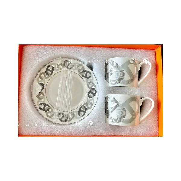 Silver runway double cup and saucer