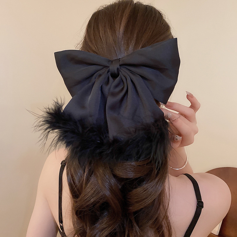 Women's Simple Style Bow Knot Alloy Cloth Feather Hair Clip display picture 16