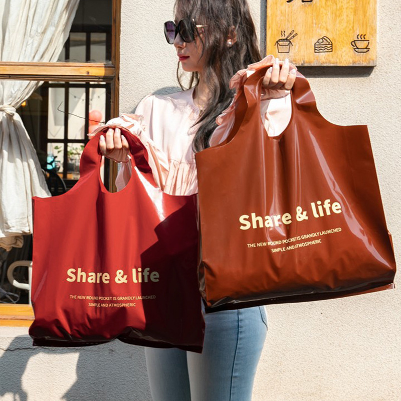 服装店手提袋安可拉红购物袋女装塑料包装袋打包袋装衣服袋子定制