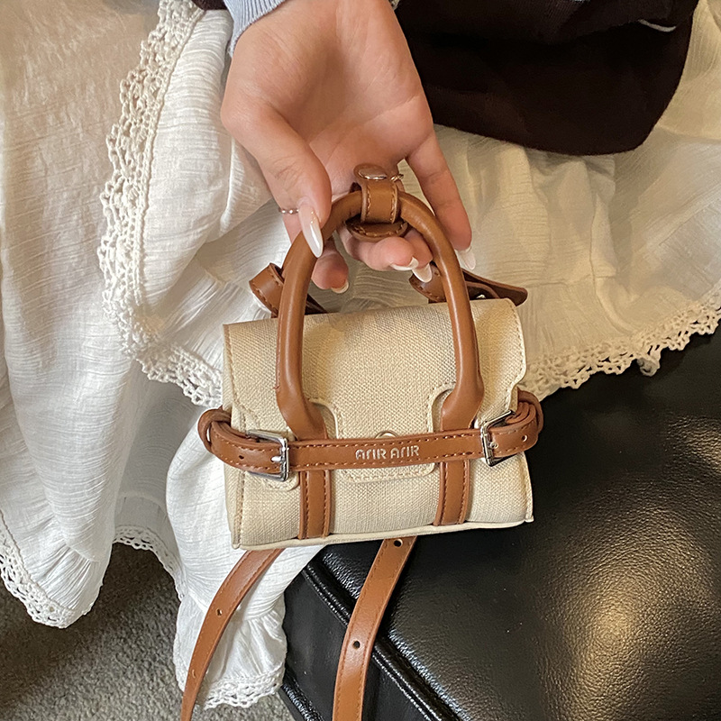 Moda coreana de patrón de leopardo, bolso de hombro para niños y niñas, bolso mini para niños con letras extranjeras, bolso de accesorios para niños.
