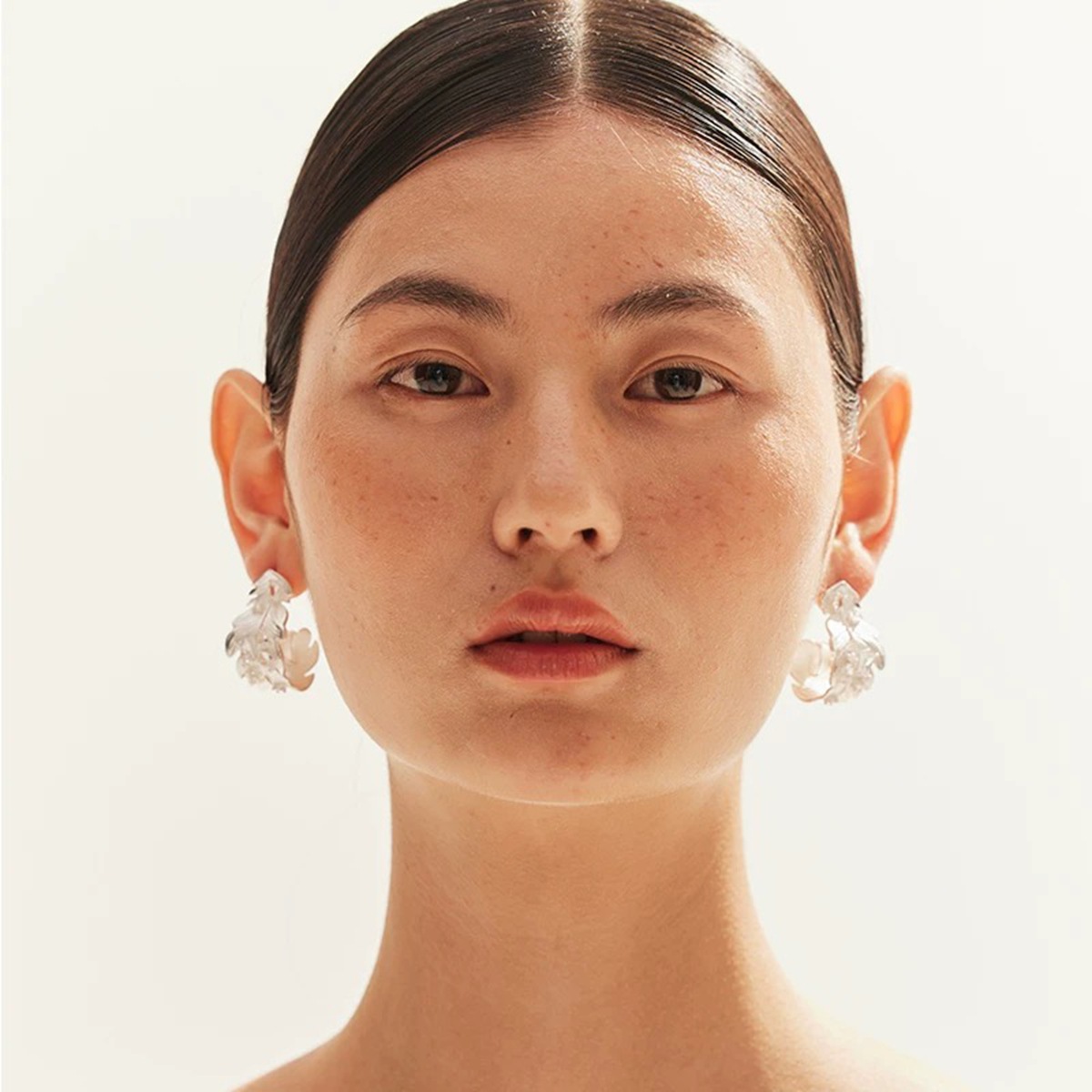 Small design three dimensional elegant earrings with zircon
