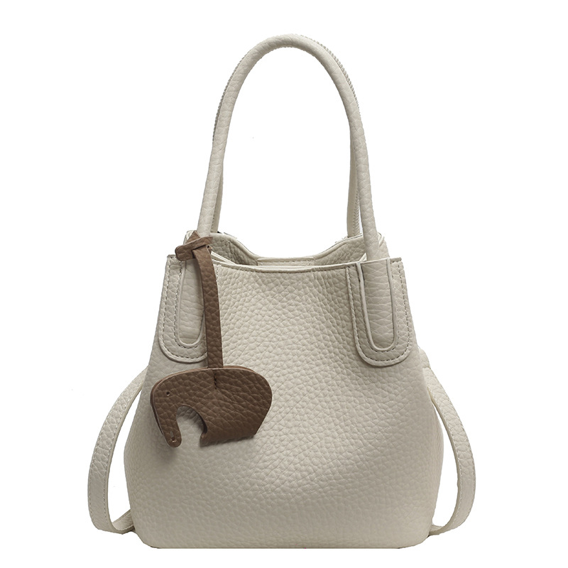 Bolso de estilo extranjero de alta gama, bolso de mujer de verano 2024, nuevo y popular bolso de mano de moda súper caliente, bolso de cubo de agua de mano