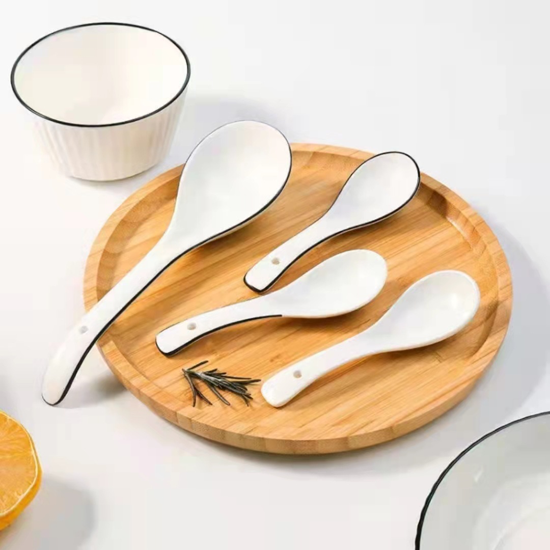 Cucharas de cerámica al por mayor, blancas puras con bordes negros, cucharas para sopa, cucharas para arroz, cucharas de mango largo con forma de cisne, vajilla diaria, utensilios de mesa estilo occidental.