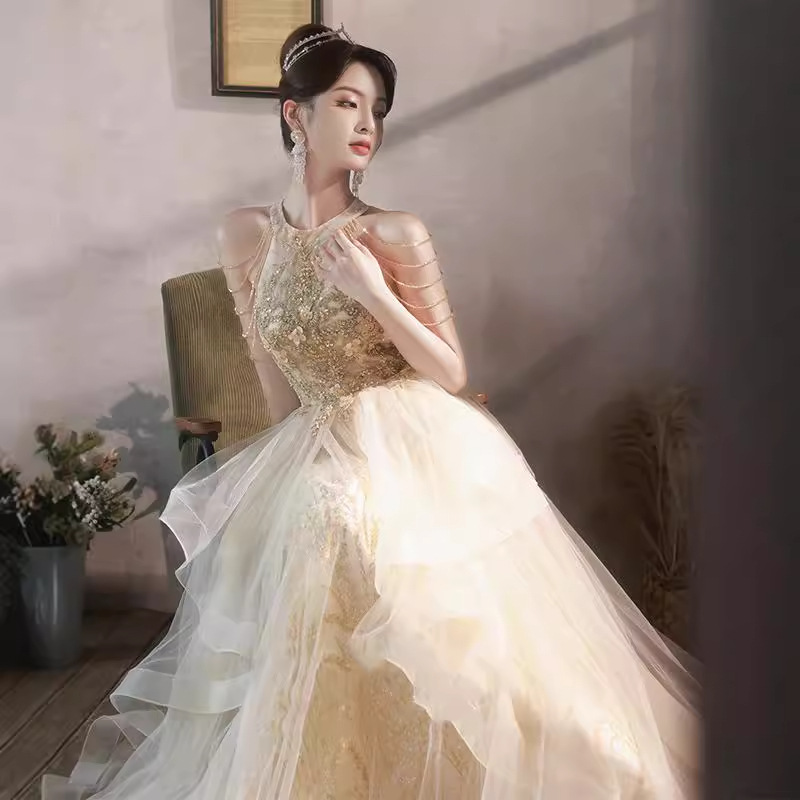 Vestido de noche de champagne temperamento de banquete de otoño anfitrión de alto nivel lujo nicho de gama alta vestido de examen de arte para adultos