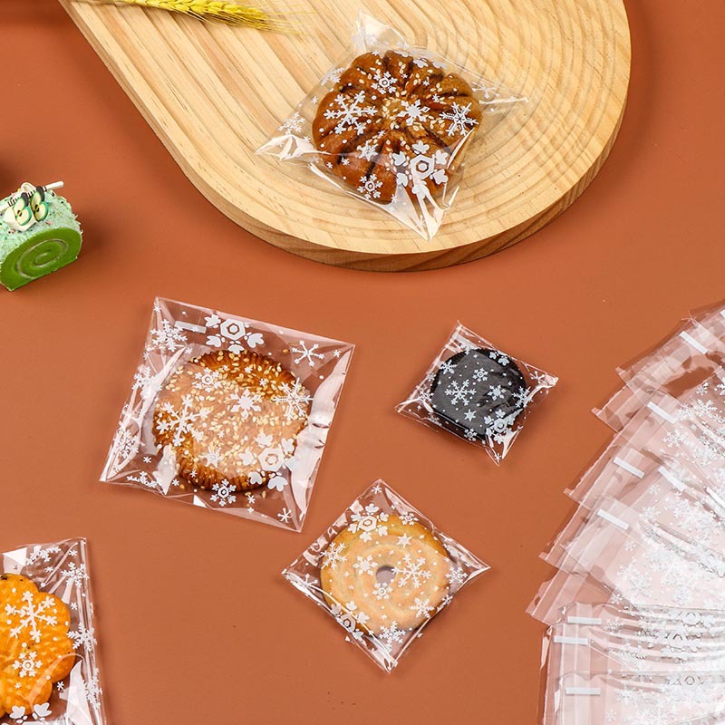En stock venta al por mayor OPP bolsa autoadhesiva bolsa de galletas de pan transparente de calidad alimentaria copo de nieve pastel de Luna crujiente bolsa de embalaje de plástico