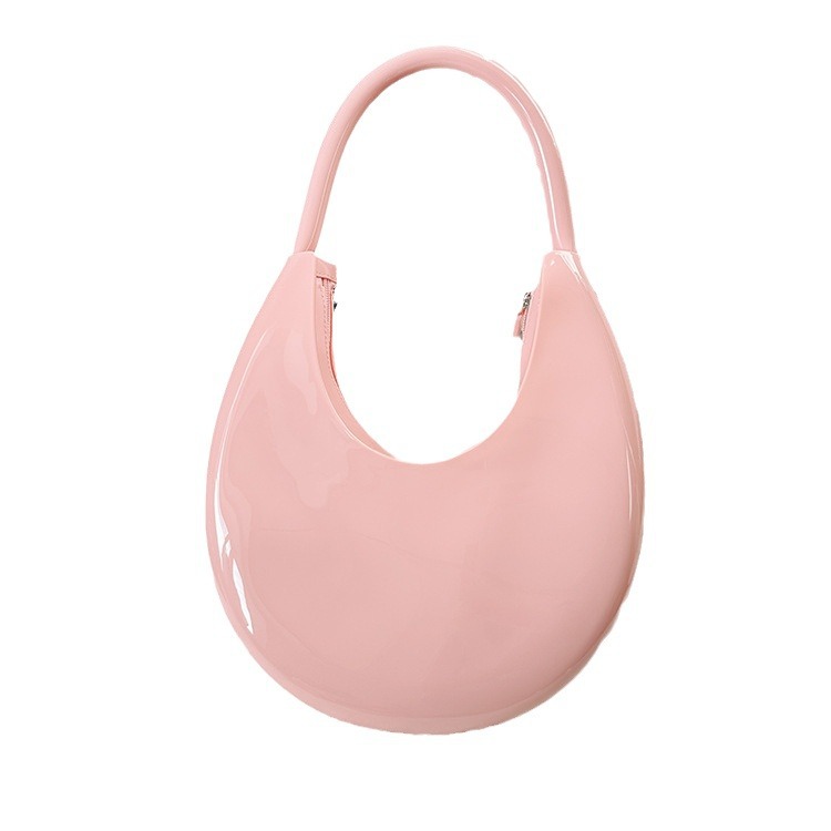 2023 nueva moda curvada Luna bolsa de jalea de mano PVC de moda de hombro de las mujeres portátiles bolsa de charol simple