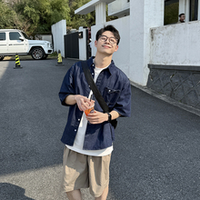 蓝色口袋牛仔衬衫短袖男生2025新款夏季百搭宽松休闲衬衣上衣简约