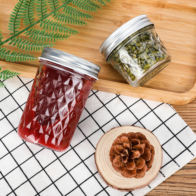 Tapa dividida caviar sub-botella de vidrio botella de mermelada de miel al por mayor transparente sellado almacenamiento doméstico puede botella
