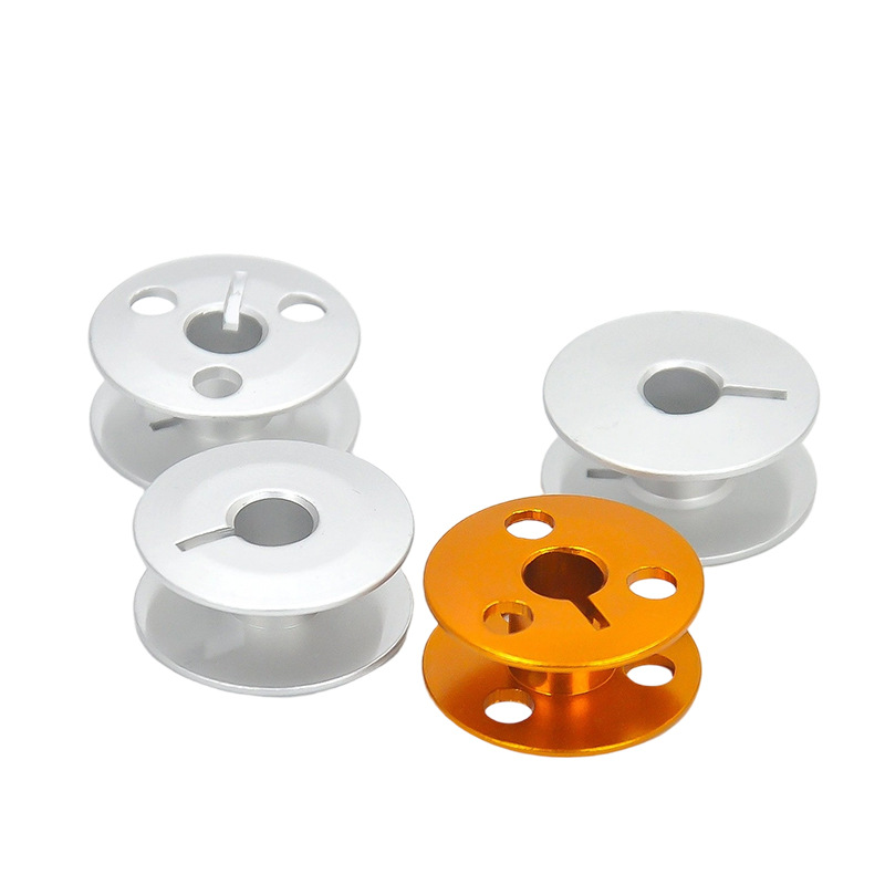 Un lote de computadora de alta calidad Rolla lanzadera 591592 Núcleo de alambre de alúmina de lanzadera Accesorios para máquinas de coser industriales