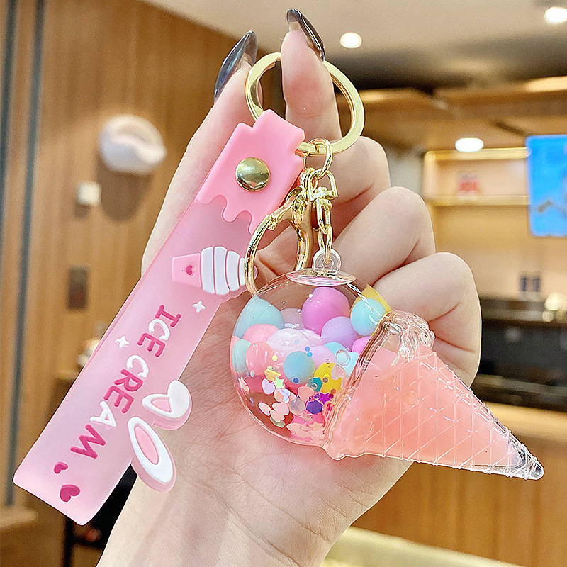 Arenas flotantes transfronterizas coloridas frijoles botellas flotantes de helado llaveras de chicas bolsos colgantes de arena flotante pequeña decoración colgante para mujeres