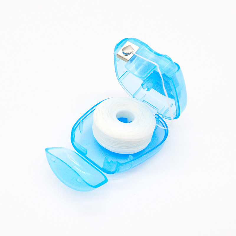 Menta sabor plana Hilo dental palillo Cuidado Oral limpieza fina hilo dental portátil en caja 50 m/rollo
