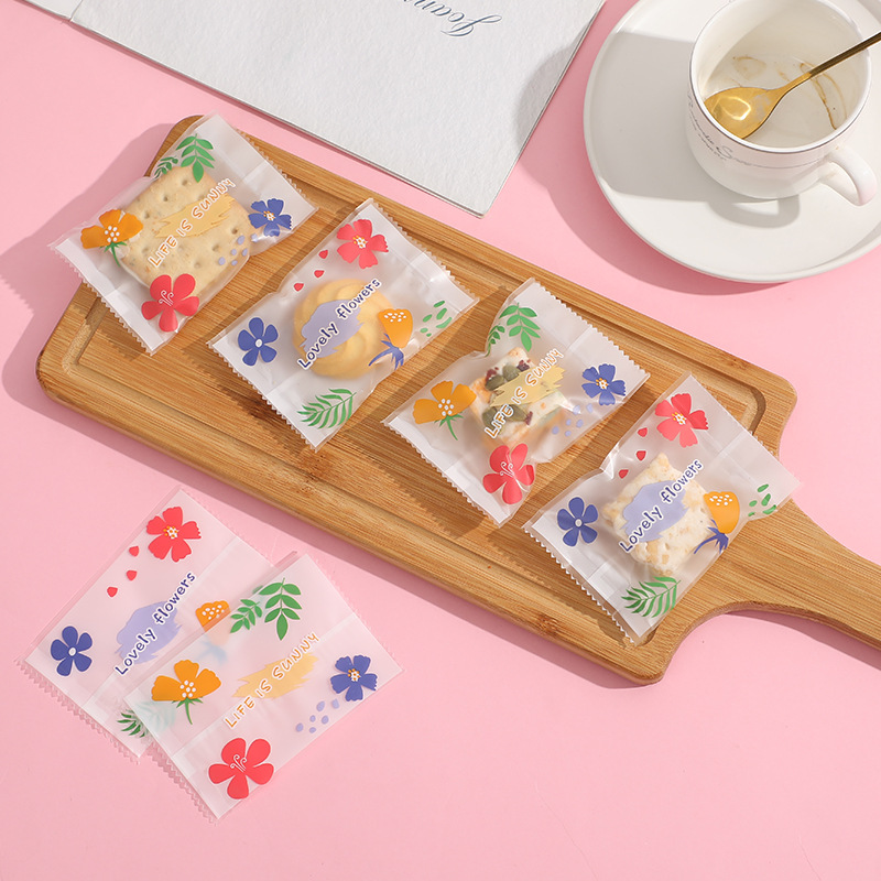 Frosted copo de nieve crujiente bolsa de embalaje hornear postre galleta pequeña bolsa de galletas dulces leche Jujube beef biscuit machine Seal bolsa