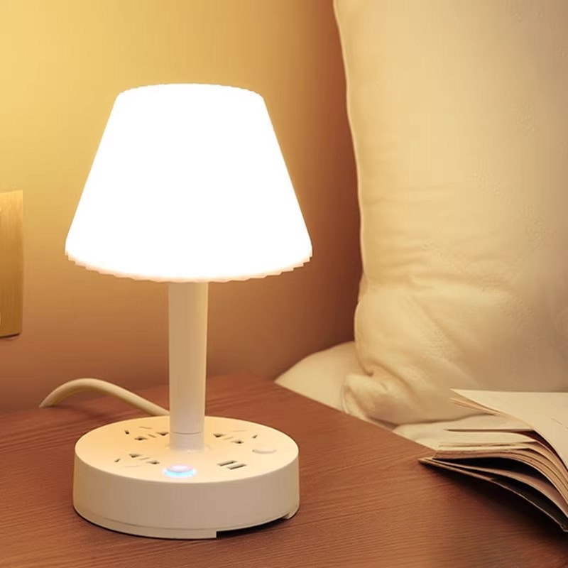 Lámpara de escritorio multifuncional enchufe de lámpara de cabecera protector de ojos integrado luz de cabecera de cama multi-engranaje luz fría y cálida doméstica LED lámpara de dormitorio al por mayor
