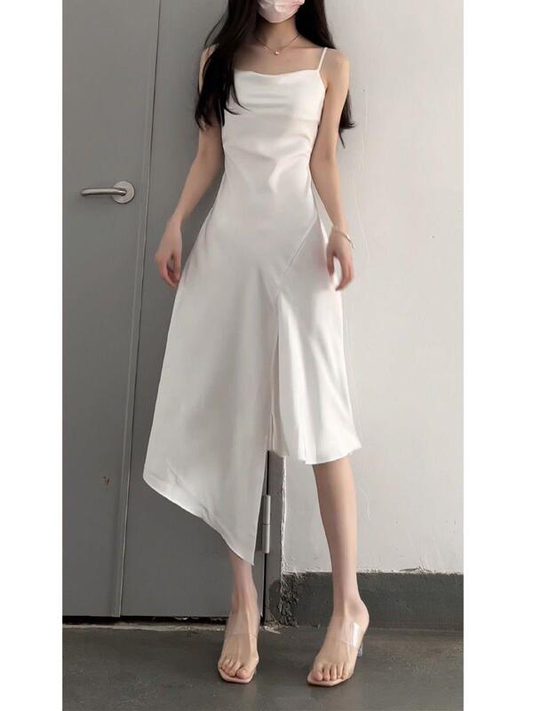 Women's Summer White Satin-Like Suspender Dress with a Stylish Slit Design and Irregular Mid-Length Skirt Women's Summer White Satin-Like Suspender Dress with a Stylish Slit Design and Irregular Mid-Length Skirt
