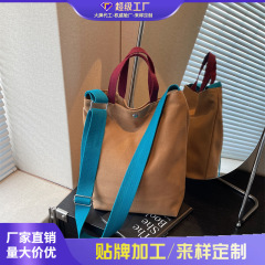 外国貿易の手提げの肩のトートの布の包みの女性の新型のシンプルな通勤のデザイン感の小さい大衆の大容量のレジャーのバケツの包み
