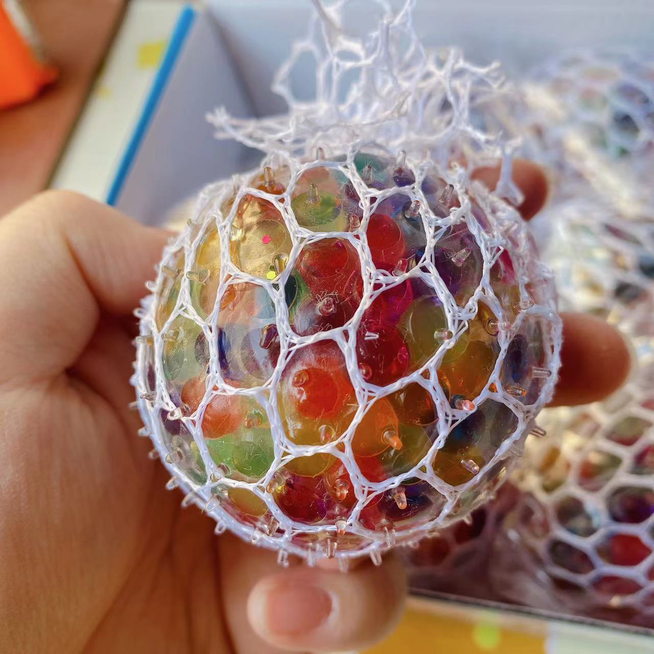 Fábrica directa ventilación bola de uva mano extrusión de descompresión creativa polo acuático novedad oro especial regalos de bola de uva