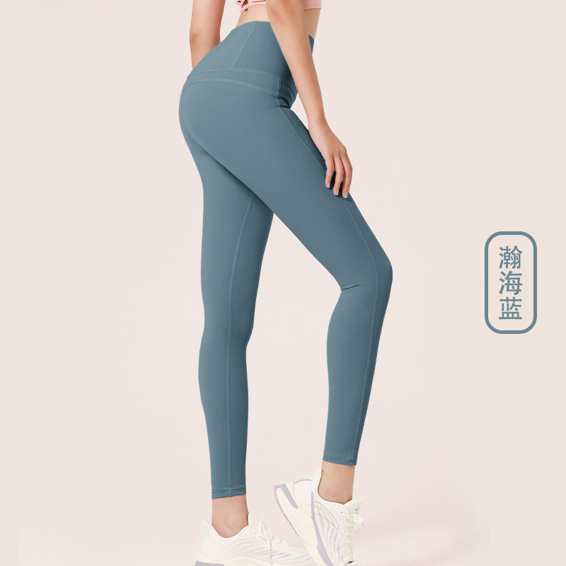 Juyitang europeo y americano desnudo melocotón verano fitness Pantalones mujer apretado cintura alta cadera elevación estiramiento correr deportes yoga Pantalones