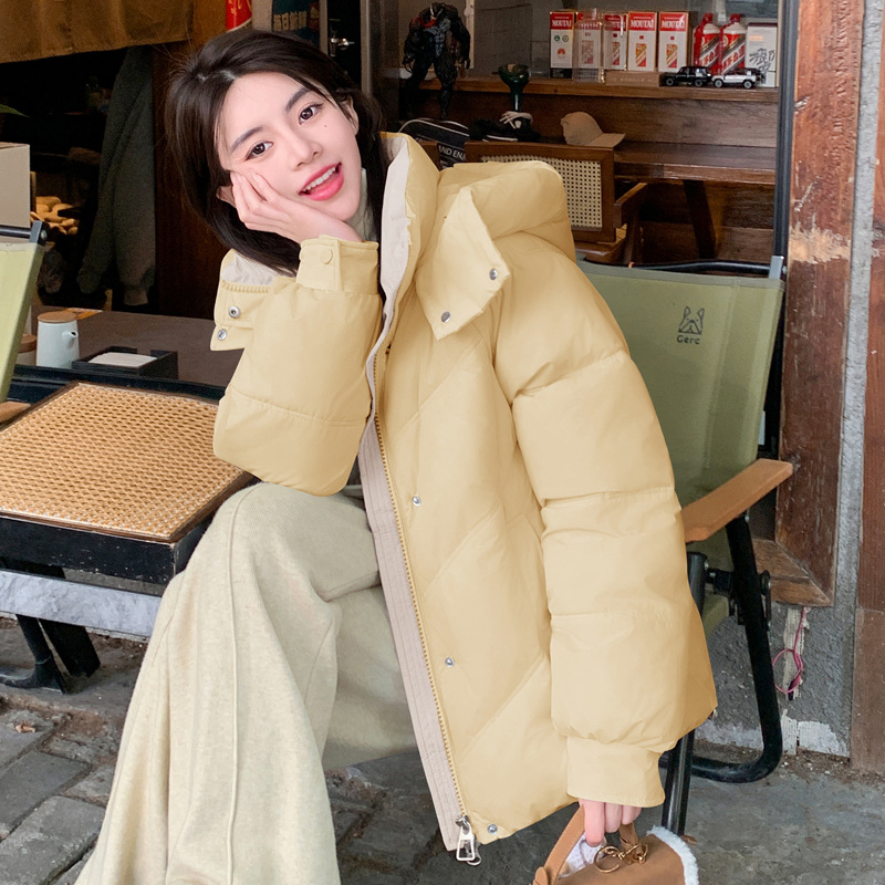 Chaqueta de algodón de pluma para mujeres 2024 invierno nuevo estilo holgado versátil coreano chic nicho suave chaqueta de algodón con capuz