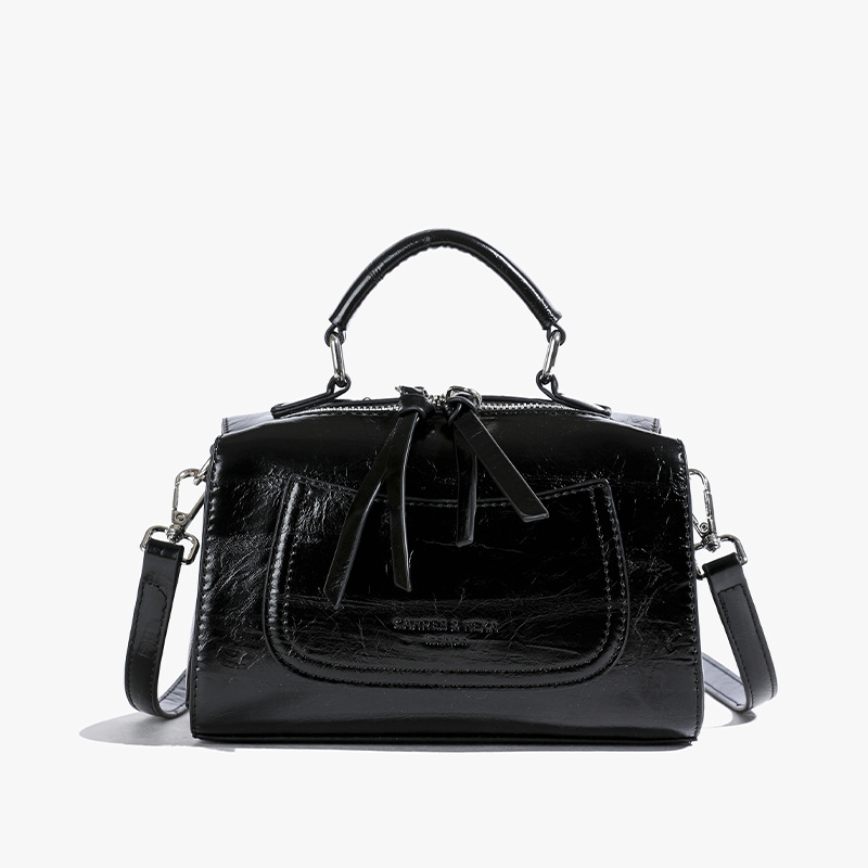 Bolso de mano de tendencia retro para mujeres 2025 nuevo diseño versátil bolso de almohada transfronterizo simple alta sensación mochila