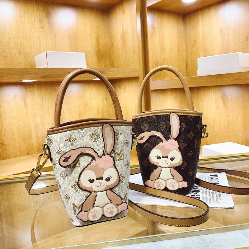 Mode Eimer Tasche für Frauen 2023 Frühjahr neue vielseitige niedliche Kaninchen Tasche High-End Casual Schulter Umhängetasche_voghion.com