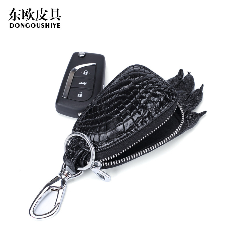 本物のワニの皮のキーはワニの爪のキーを包んで、男女の本革の自動車の鍵はビジネスの車のアクセサリを包みます。