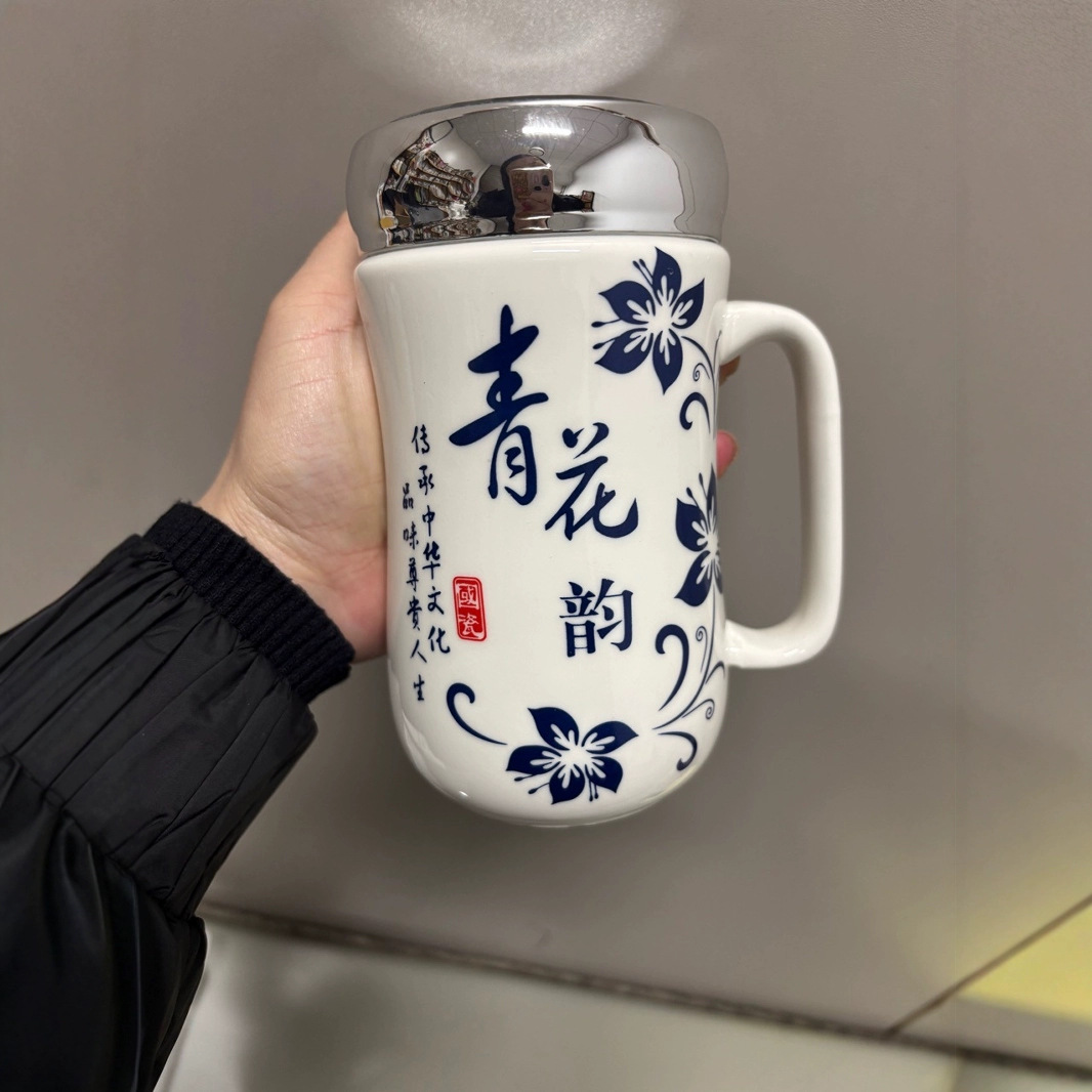 Taza de cara con espejo de rima azul y blanco Taza de cerámica al por mayor para el cabello Taza de agua potable de alto valor para el hogar Cerámica para estudiantes de dibujos animados