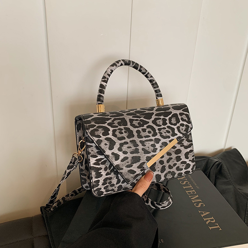 Textura de color contrastante empalme mochila de invierno 2024 nuevo estilo de moda de mujeres este año patrón de estampado mochila