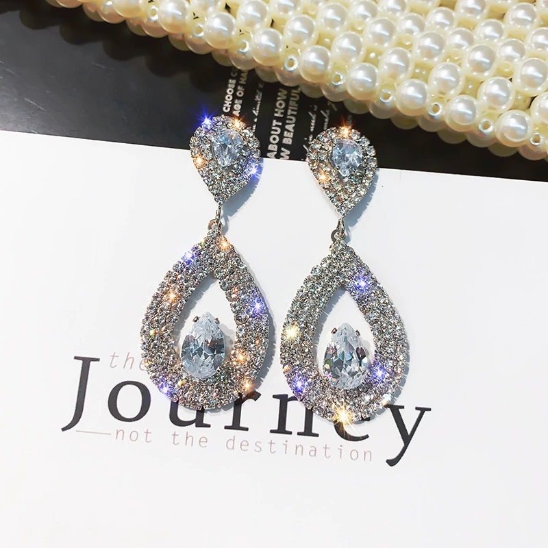Design elegant earrings, high-quality style, micro incrustation, diamond encrusted