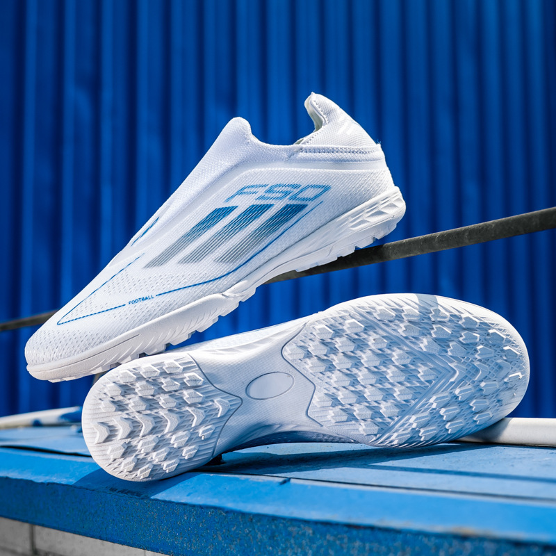 Copa del Mundo transfronteriza F50 zapatos de fútbol estudiantes adolescentes hombres zapatos de entrenamiento de entrenamiento de entrenamiento de clavos al por mayor