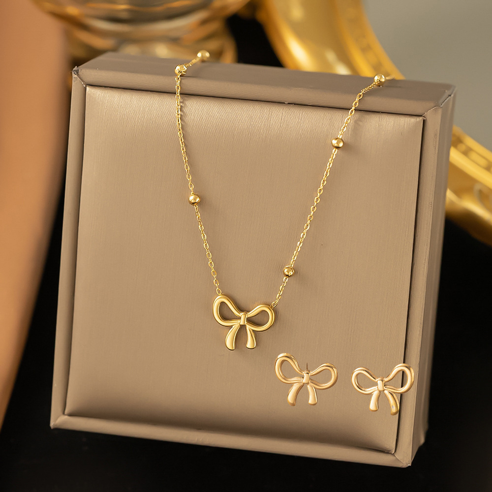 Juego de joyería de acero de titanio 2023 – collar, aretes, de alta gama, venta al por mayor