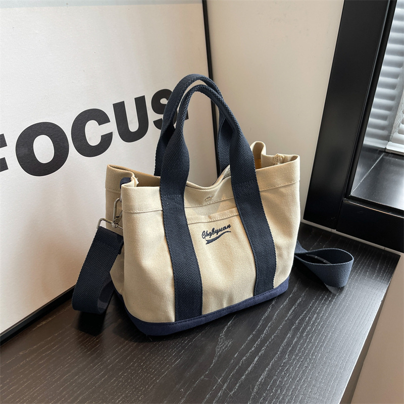 Japanese canvas multi-layer bag letter embroidery handbag commuter lunch bag student multi-layer messenger bag mummy bag Japanese canvas multi-layer bag letter embroidery handbag commuter lunch bag student multi-layer messenger bag mummy bag