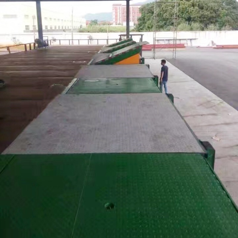 Rampa eléctrica para montacargas para carga ascendente, puente de carga fijo de 10 toneladas, plataforma ajustable fija para carga y descarga logística de contenedores.